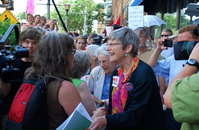Sr. Simone Campbell in a crowd gathered outside Rep. Paul Ryan's office.